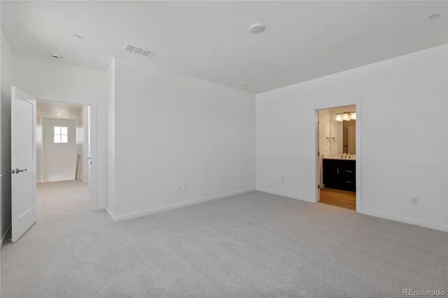 a bathroom with a double vanity sink mirror and shower