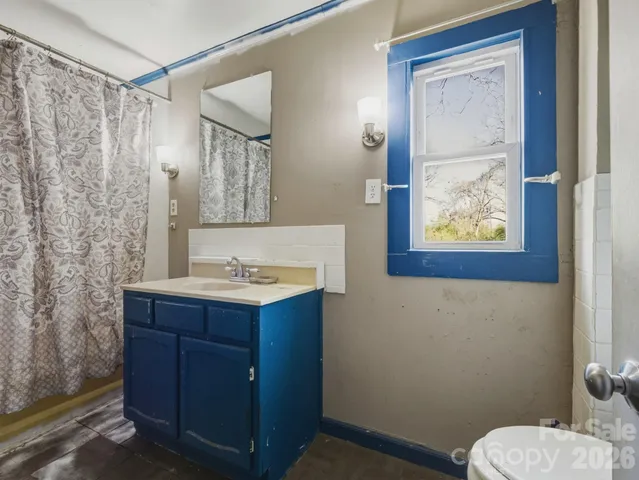 a view of a patio with chairs and table