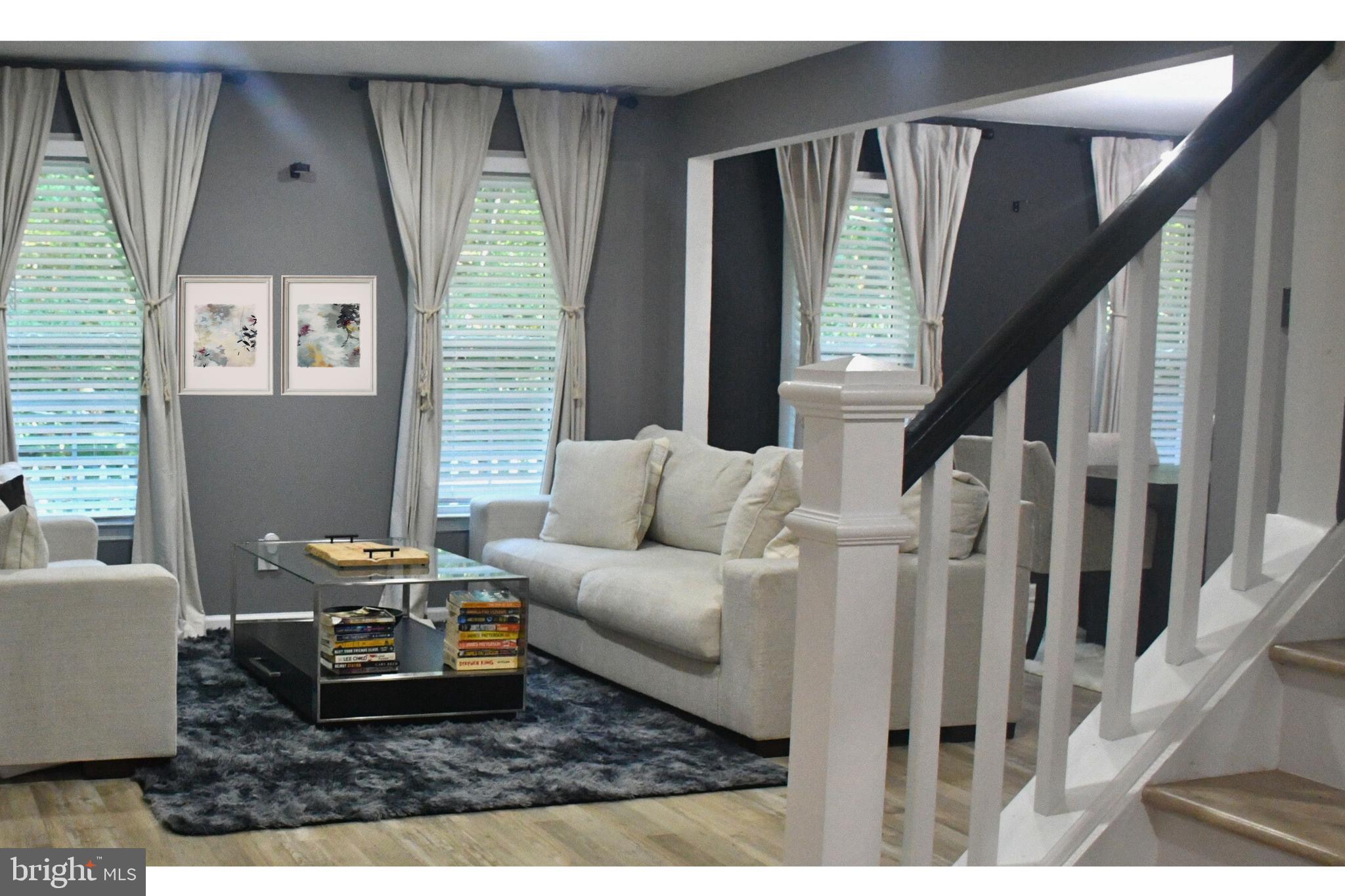 17930 Masemore Road Parkton, MD 21120 - Photo 19 of 46 a living room with furniture and a large window