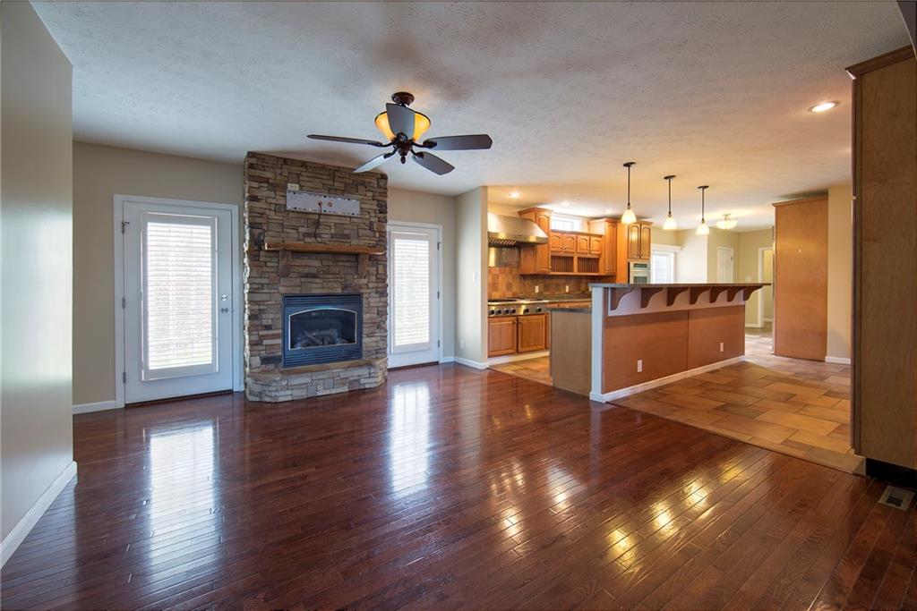 360 Turkeyfoot Road Venetia, PA 15367 - Photo 6 of 22 Southern plantation shutters cover the two doors that are beside your gas log fireplace.
