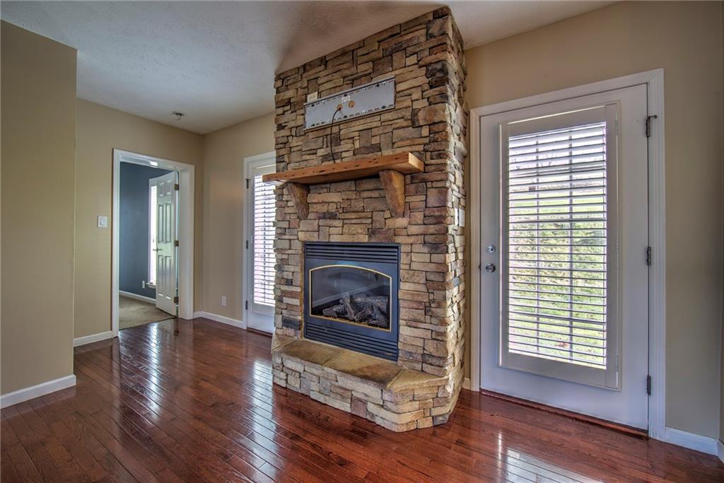 360 Turkeyfoot Road Venetia, PA 15367 - Photo 10 of 22 Stone fireplace is the main feature of the family room.