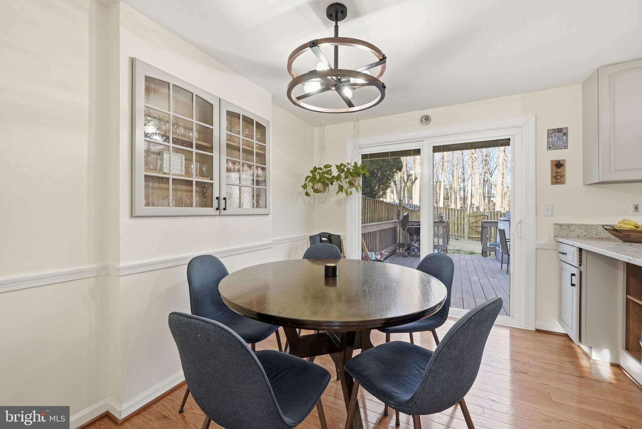 19828 Apple Ridge Place Montgomery Village, MD 20886 - Photo 6 of 31 Dining room overlooking the deck/backyard.