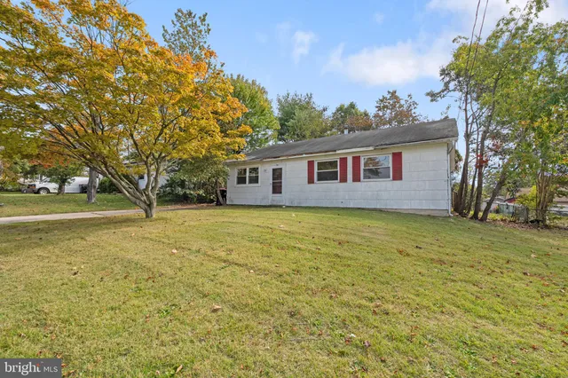 a house view with a garden space