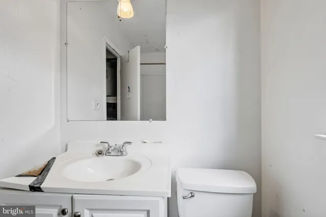 a bathroom with a sink and a toilet