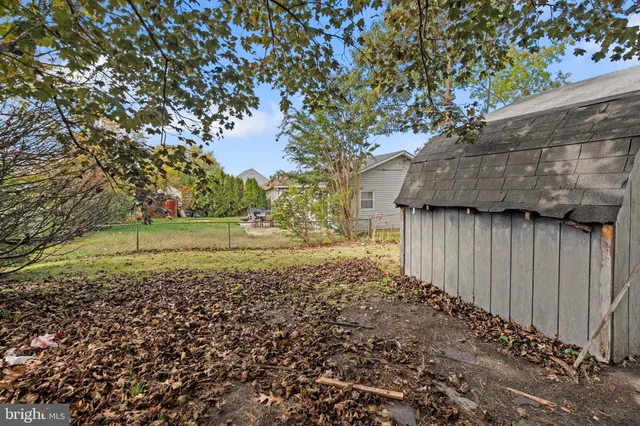 a view of backyard with green space
