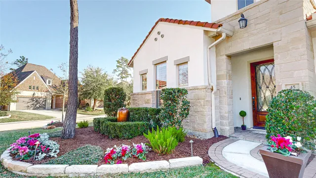 a front view of house with yard and outdoor seating
