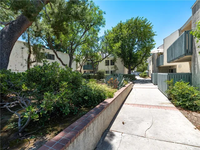 a view of balcony with floor and trees