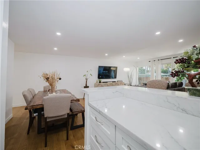 a kitchen with a table and chairs in it