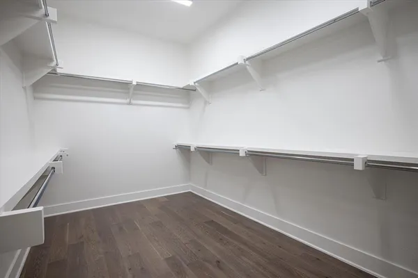 a view of an empty walk in closet