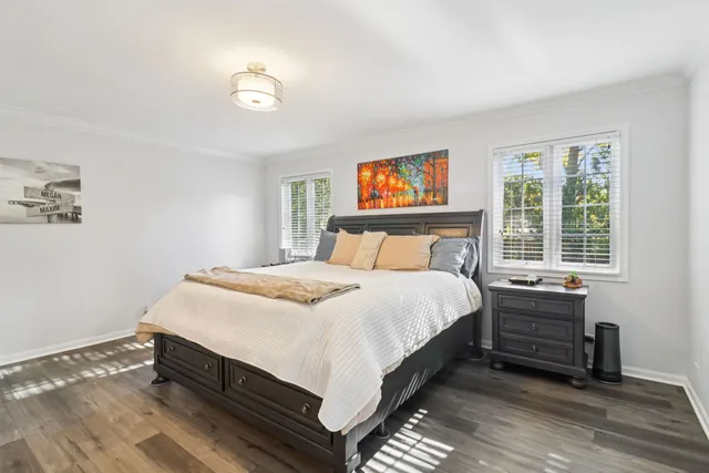 a bedroom with a bed and furniture