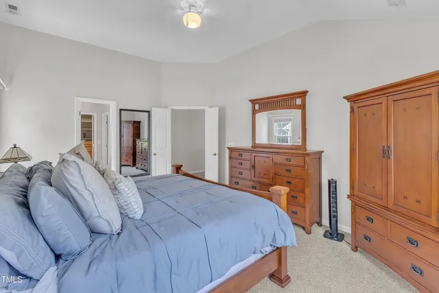 a bathroom with a double vanity sink a vanity and shower