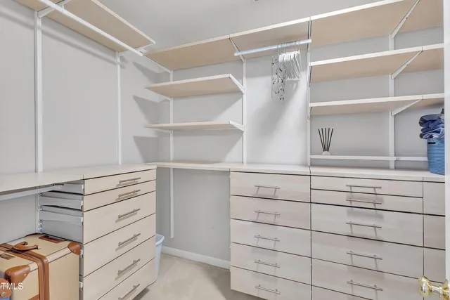 a view of a livingroom with furniture