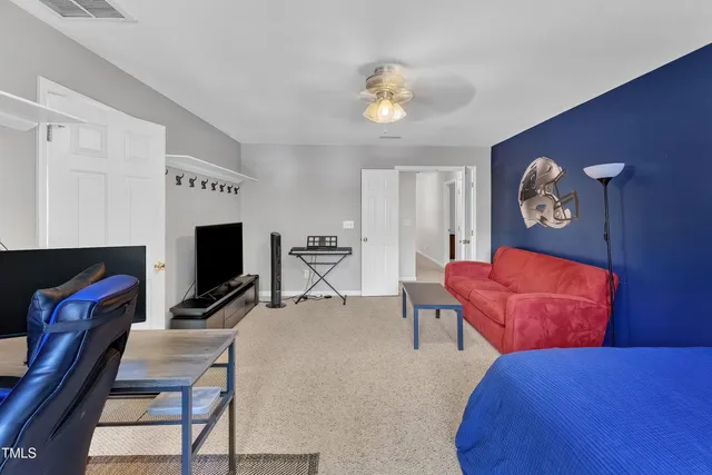 a livingroom with a large window