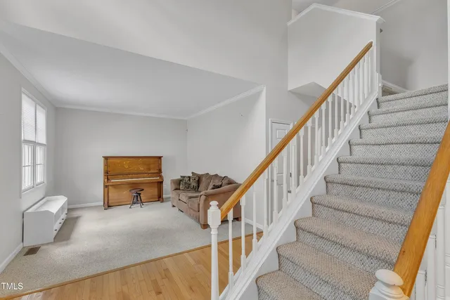a bedroom with furniture and a lamp