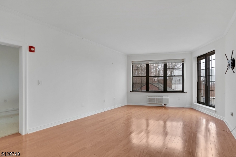 7 Prospect Street, Unit 303 Morristown, NJ 07960 - Photo 15 of 22 a view of an empty room with a window