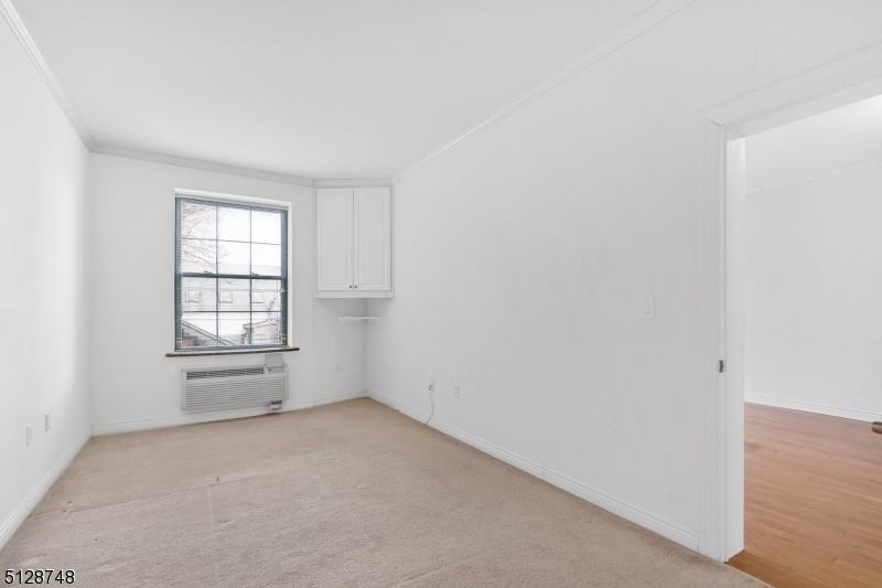 7 Prospect Street, Unit 303 Morristown, NJ 07960 - Photo 17 of 22 an empty room with windows