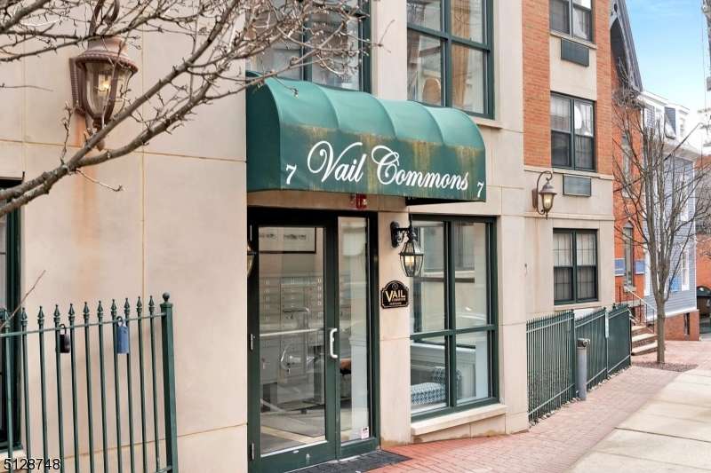 7 Prospect Street, Unit 303 Morristown, NJ 07960 - Photo 2 of 22 a sign on a pole on a street