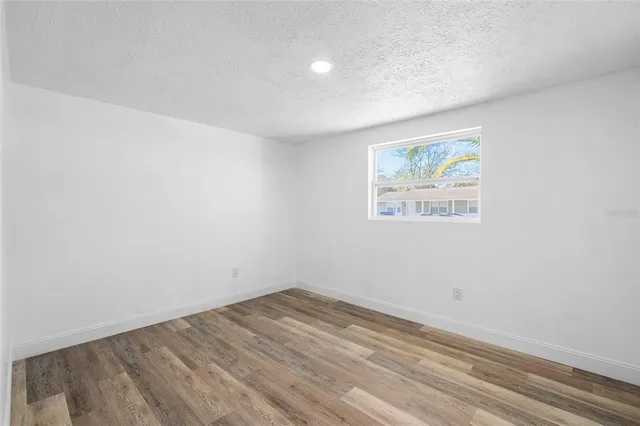 an empty room with a bench