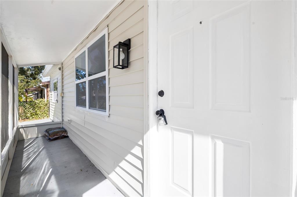 4244 Mesa Drive New Port Richey, FL 34653 - Photo 4 of 35 a bathroom with a bathtub and a window