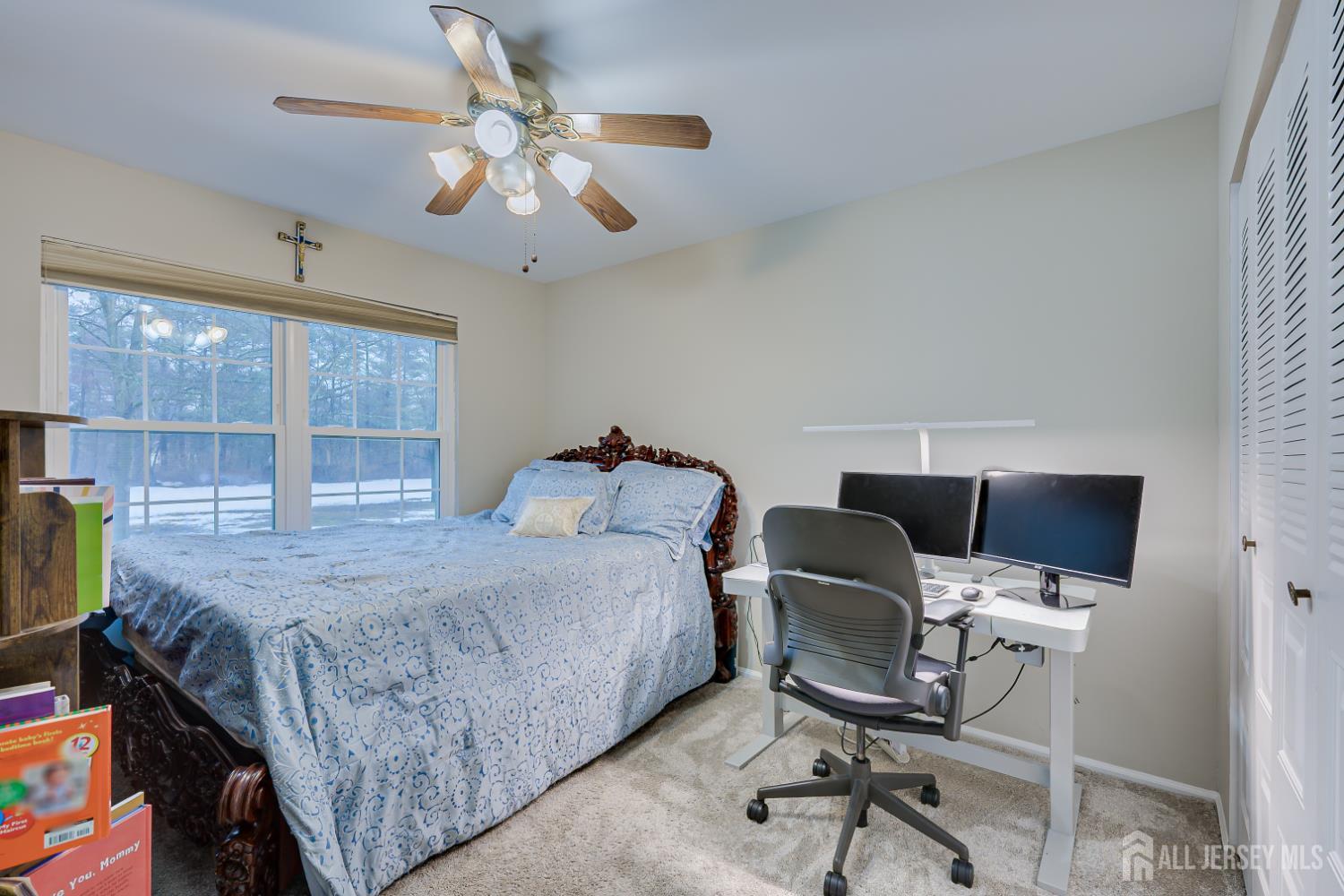 199 Applegate Lane East Brunswick, NJ 08816 - Photo 24 of 38 a bedroom with a bed and a chair