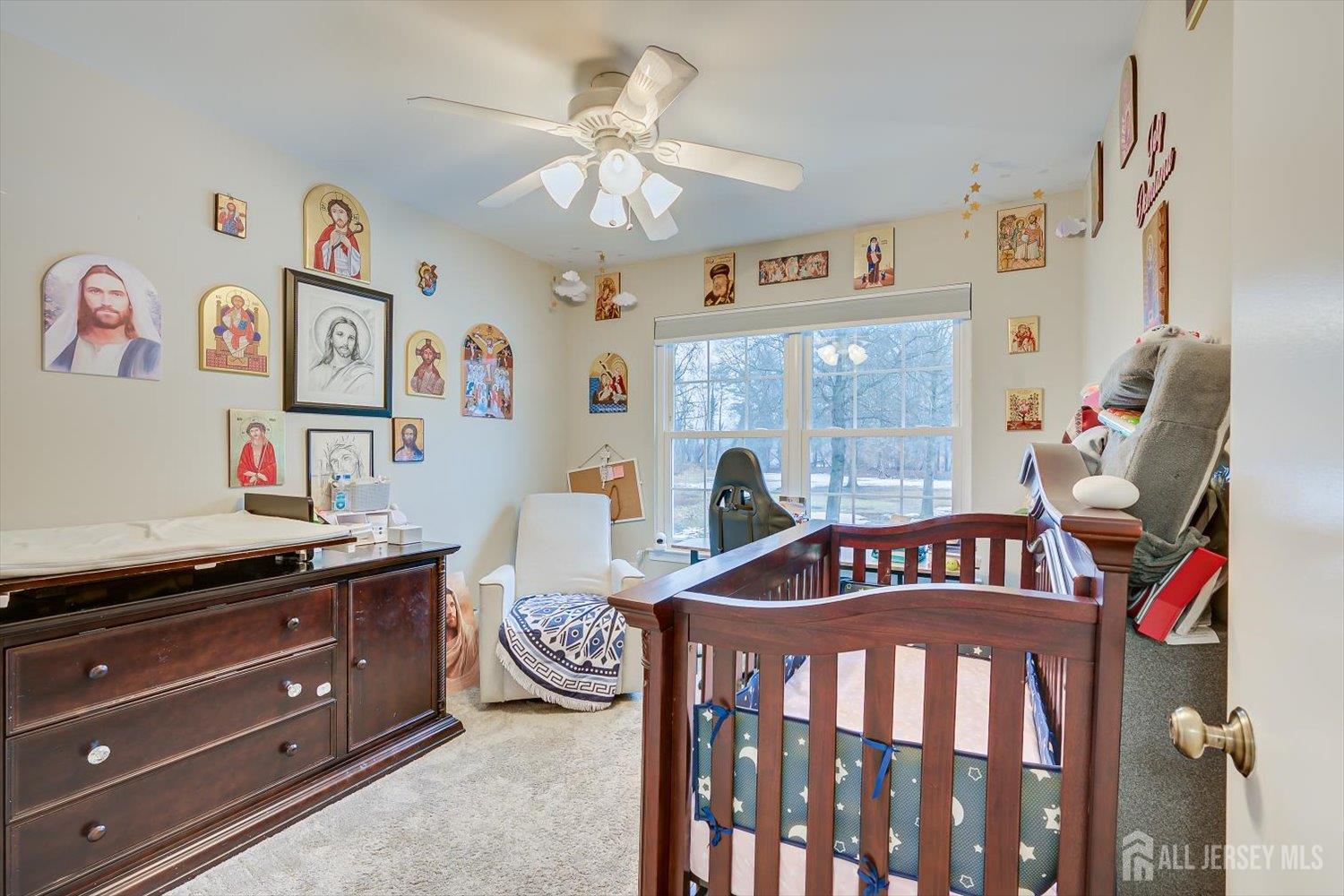 199 Applegate Lane East Brunswick, NJ 08816 - Photo 27 of 38 a bedroom with furniture and a window
