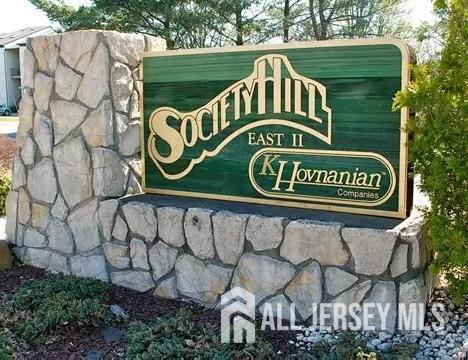 199 Applegate Lane East Brunswick, NJ 08816 - Photo 37 of 38 a sign that is on the wall of the building