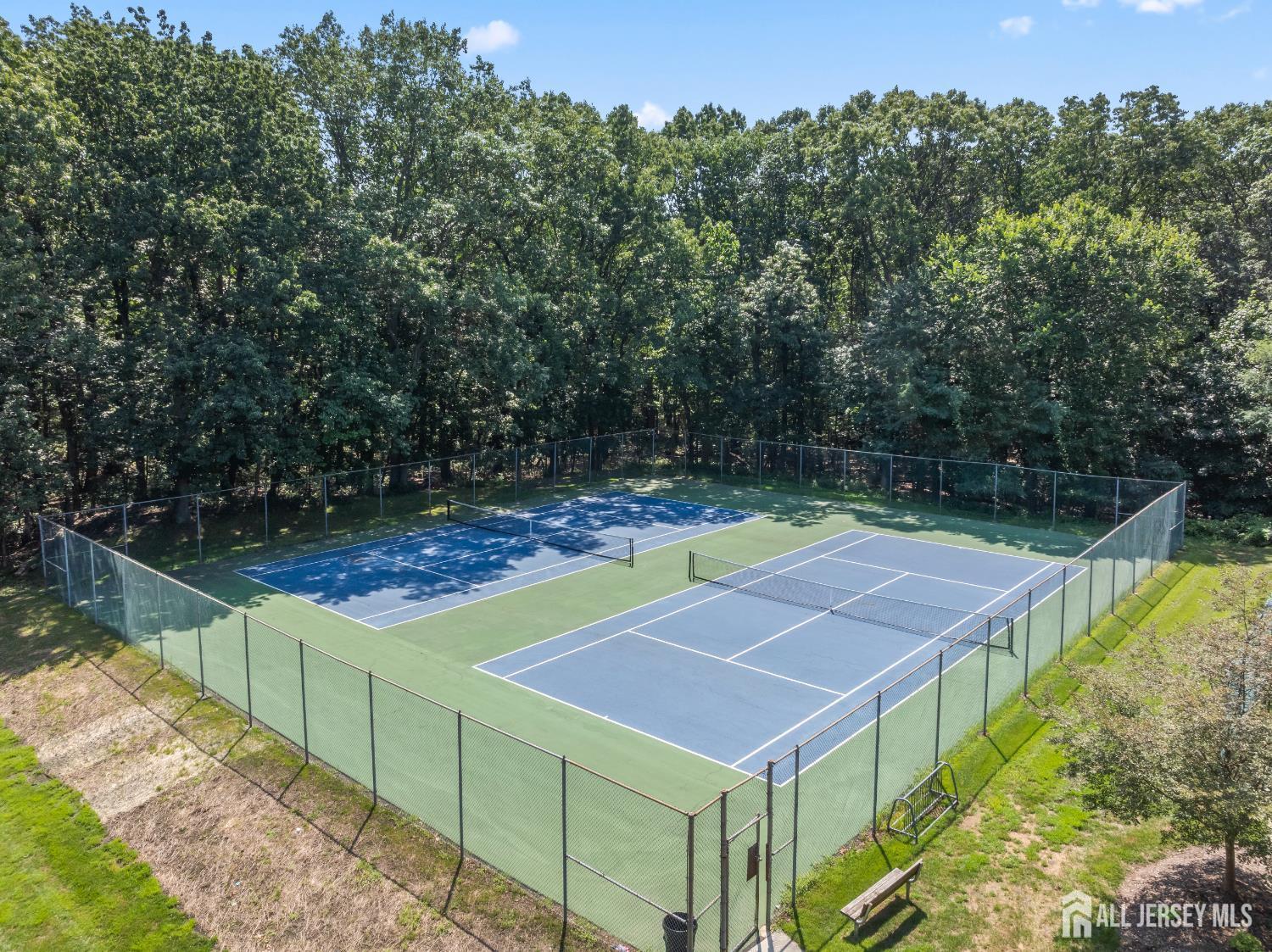 199 Applegate Lane East Brunswick, NJ 08816 - Photo 38 of 38 a view of a tennis court with sitting area