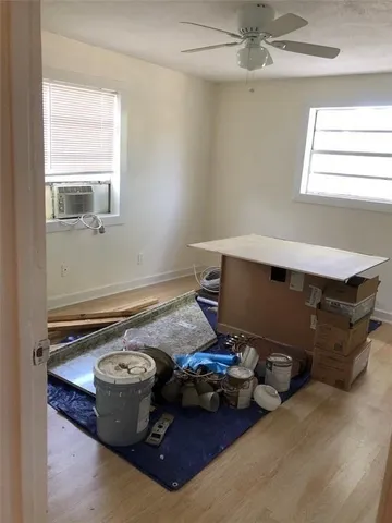 a room with furniture and window