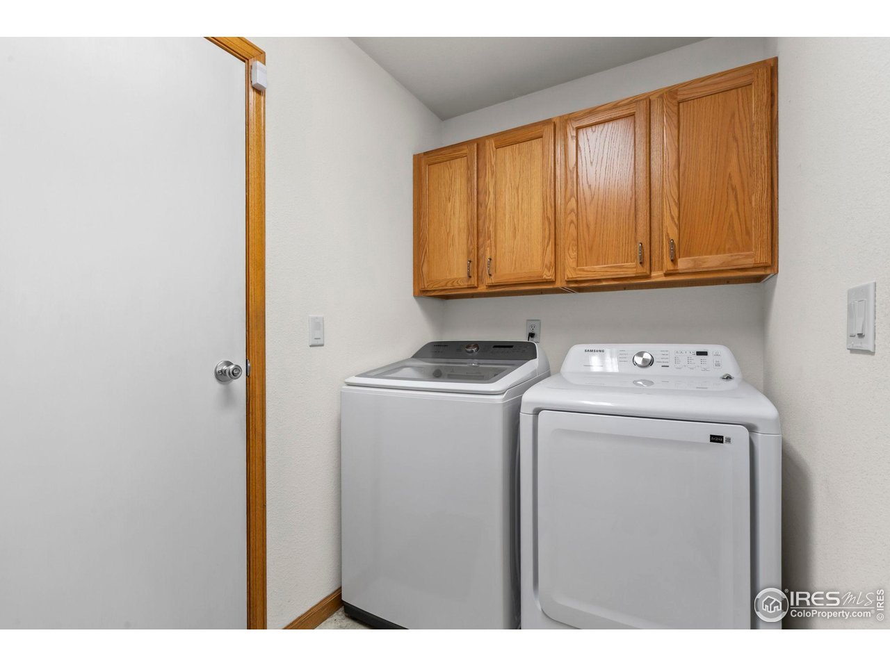 3012 54th Avenue Greeley, CO 80634 - Photo 15 of 33 a utility room with dryer and washer
