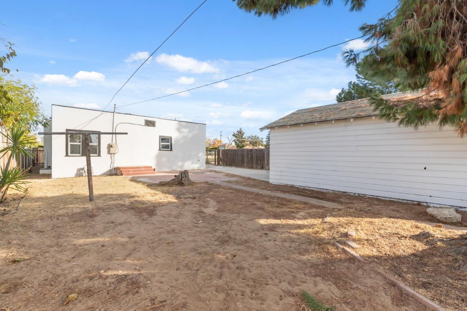 1515 North Fruit Avenue Fresno, CA 93728 - Photo 23 of 23 a view of a backyard of a house