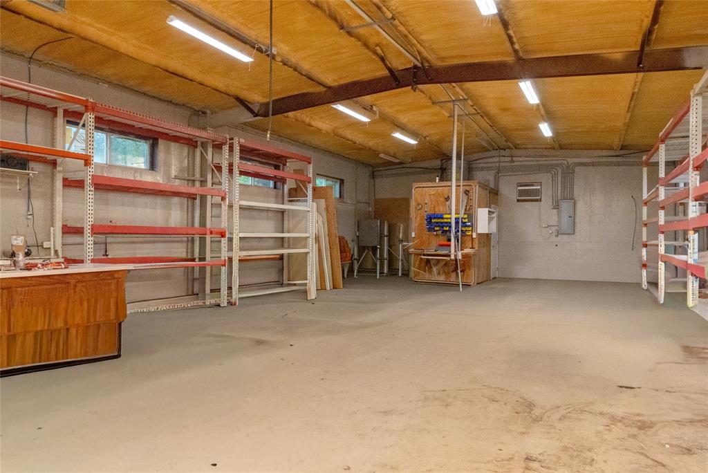 405 Kimbrough Road Azle, TX 76020 - Photo 31 of 39 a view of a storage room with a garage