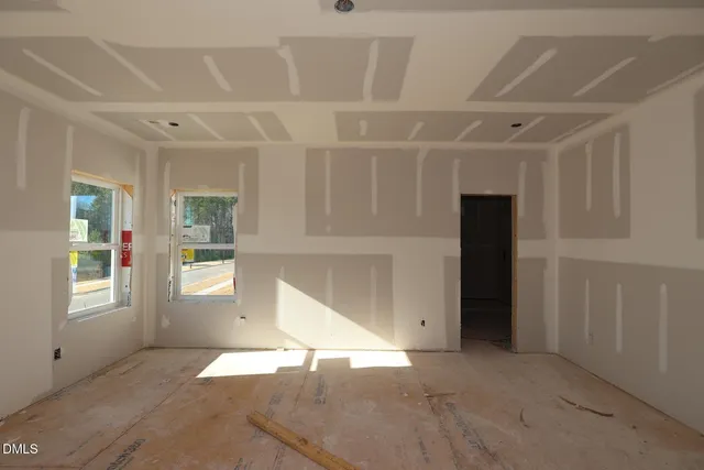 a view of entryway with window and stairs