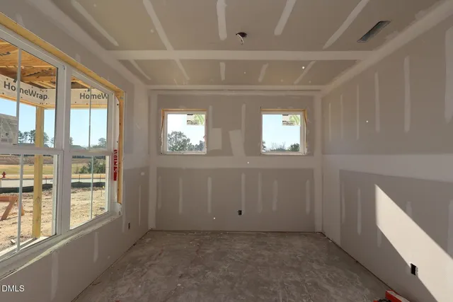 an empty room with windows