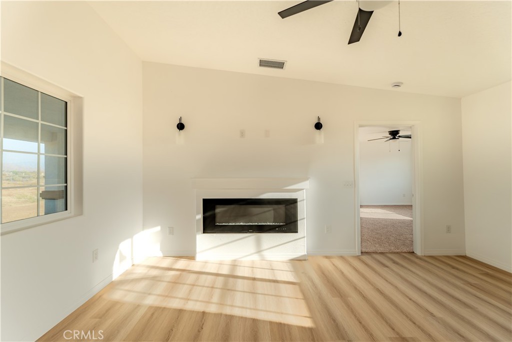 16925 Nanticoke Road Apple Valley, CA 92307 - Photo 46 of 87 a bedroom with a bed and a view of bathroom