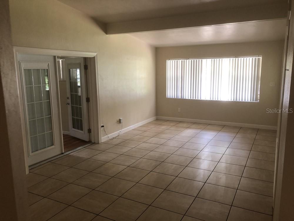 527 Northwest 36th Terrace Gainesville, FL 32607 - Photo 3 of 17 a view of an empty room and window