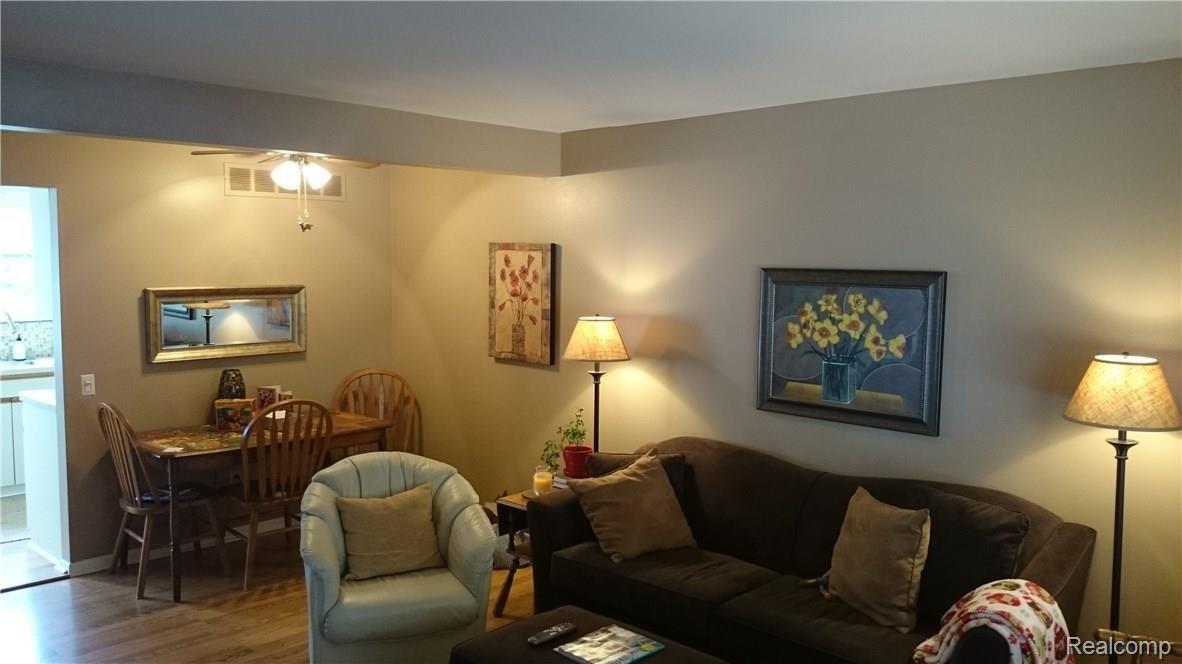 417 Baldwin Avenue, Unit 13 Rochester, MI 48307 - Photo 2 of 28 Living room and dining area