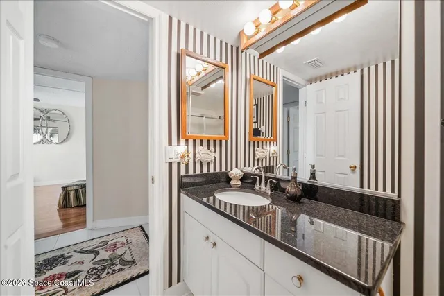 a view of a chairs and table in a patio