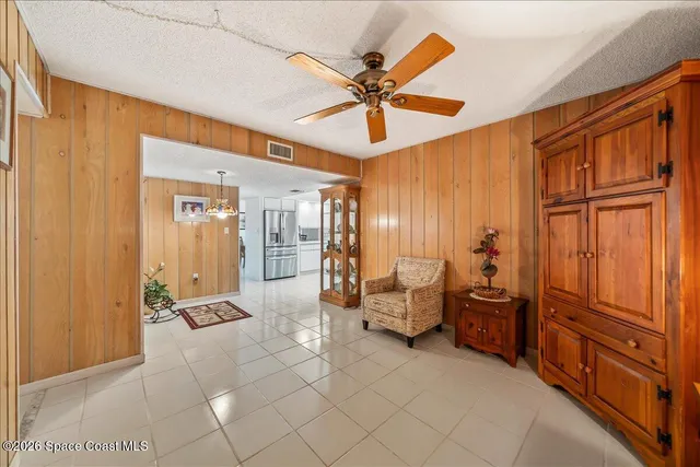 a view of a livingroom with furniture and window
