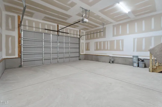 a view of an empty room with white walls