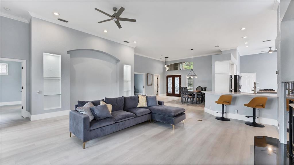 7217 Churston Lane University Park, FL 34201 - Photo 11 of 60 a living room with furniture and kitchen view