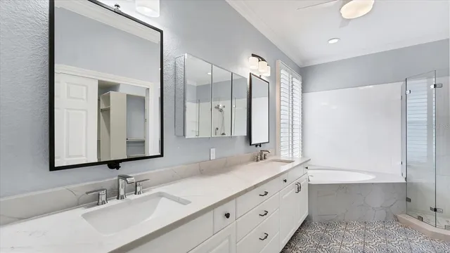 a bathroom with a double vanity sink and a mirror