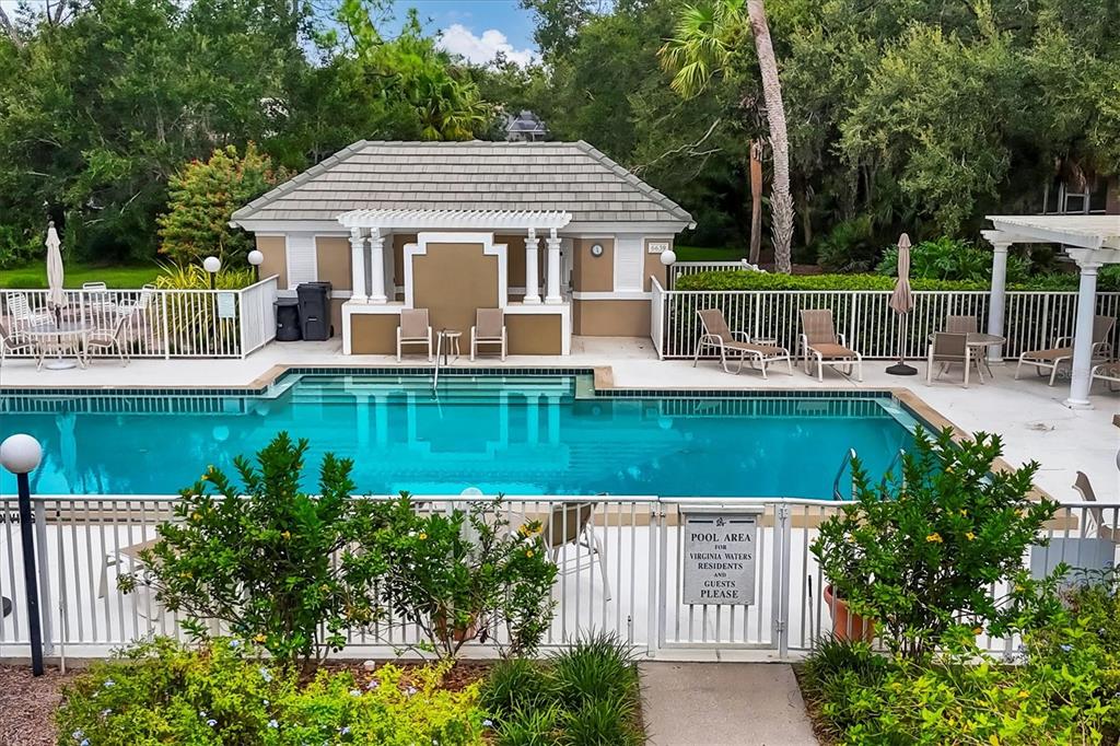 7217 Churston Lane University Park, FL 34201 - Photo 38 of 60 a front view of a house with a yard table and chairs