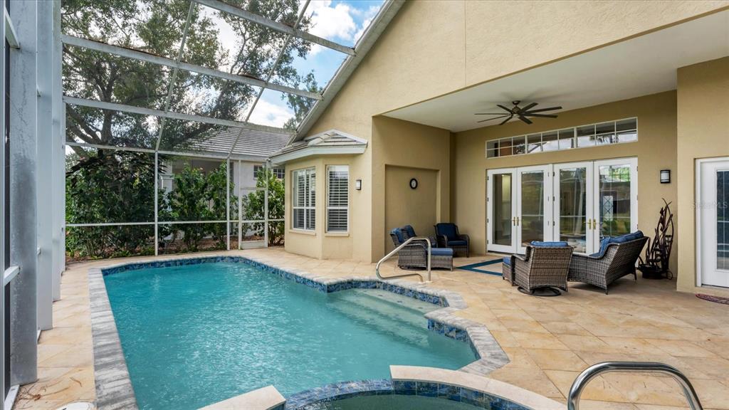 7217 Churston Lane University Park, FL 34201 - Photo 5 of 60 a view of a patio with couches chairs and potted plants