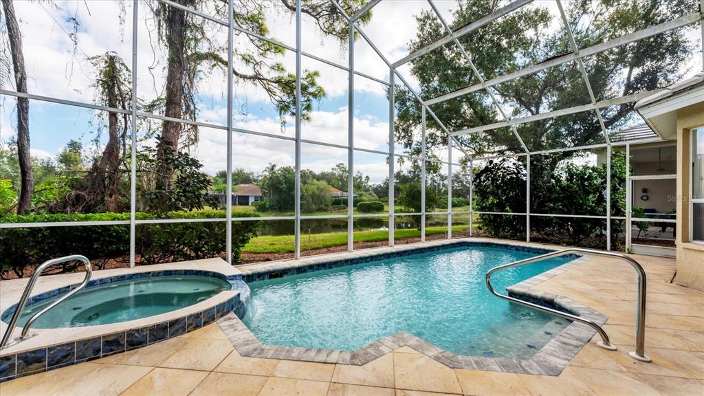 7217 Churston Lane University Park, FL 34201 - Photo 6 of 60 a view of a backyard with swimming pool and sitting area
