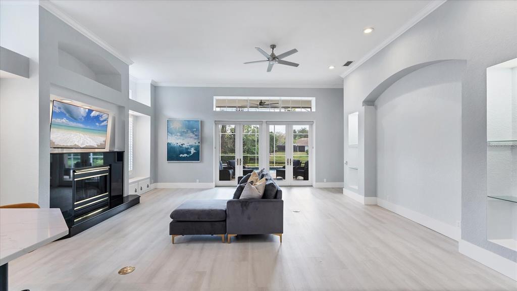 7217 Churston Lane University Park, FL 34201 - Photo 7 of 60 a living room with furniture and a large window