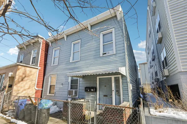 a front view of a house with a door