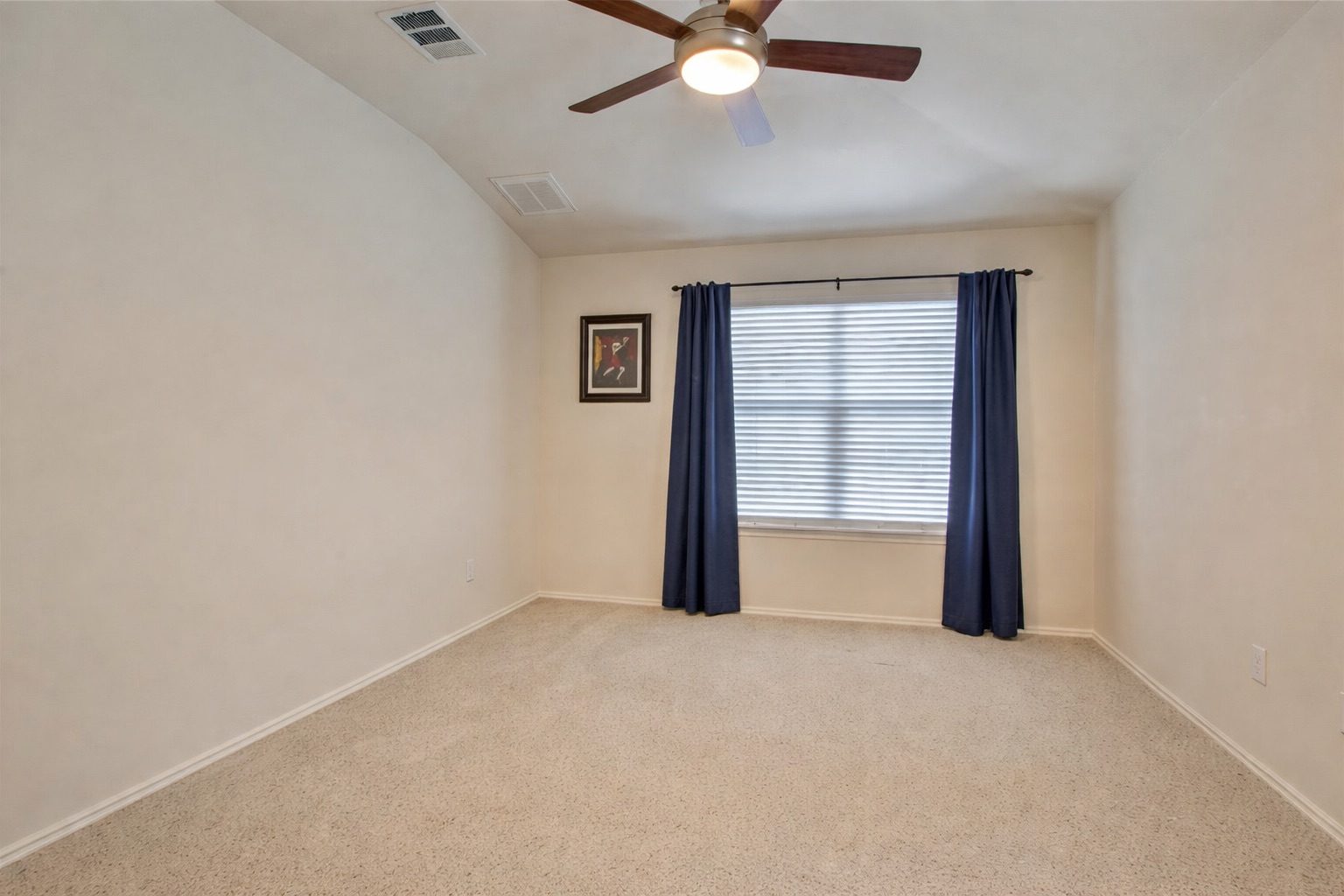 1900 Scofield Ridge Parkway, Unit 4801 Austin, TX 78727 - Photo 8 of 15 an empty room with windows and fan