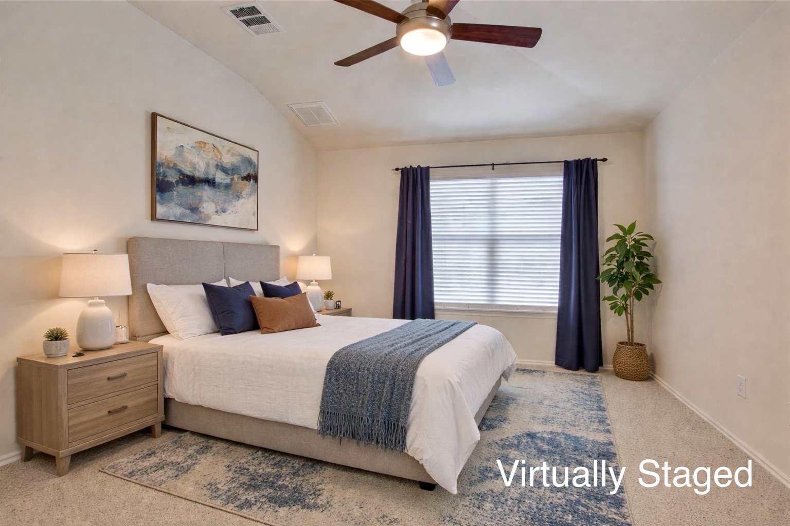 1900 Scofield Ridge Parkway, Unit 4801 Austin, TX 78727 - Photo 9 of 15 a bedroom with a bed and a potted plant