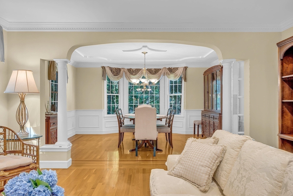 157 Lancaster Road North Andover, MA 01845 - Photo 19 of 42 a living room with furniture and a large window