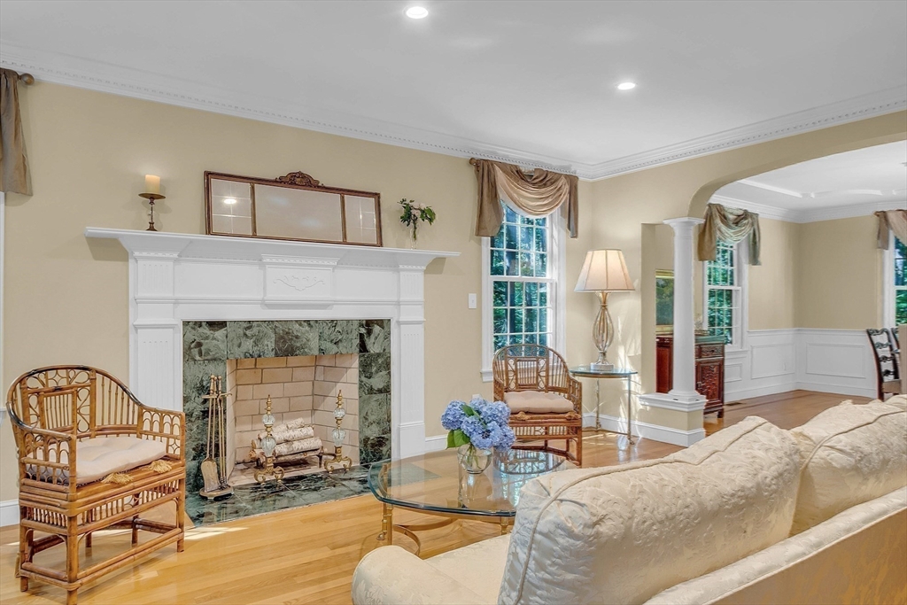 157 Lancaster Road North Andover, MA 01845 - Photo 22 of 42 a living room with furniture and a fireplace